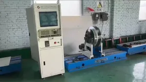 ماكينة موازنة بنظام محامل ثابتة (مع نظام نقل الحركة بالسير)، طراز YYQ-300/YYQ-500 (قطر القطعة: Ø1500mm، الوزن: 8-500kg)